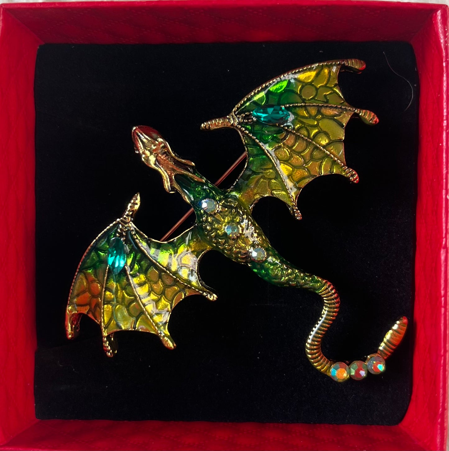 Dragon brooch green/ gold coloured