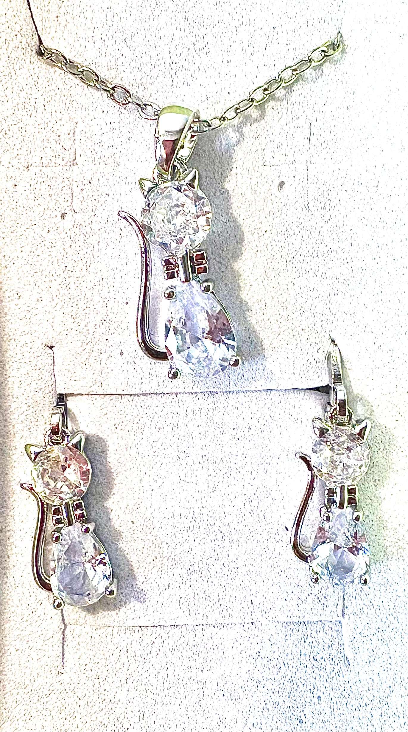Cat 2pc Jewellery set - silvery coloured with imitation crystals