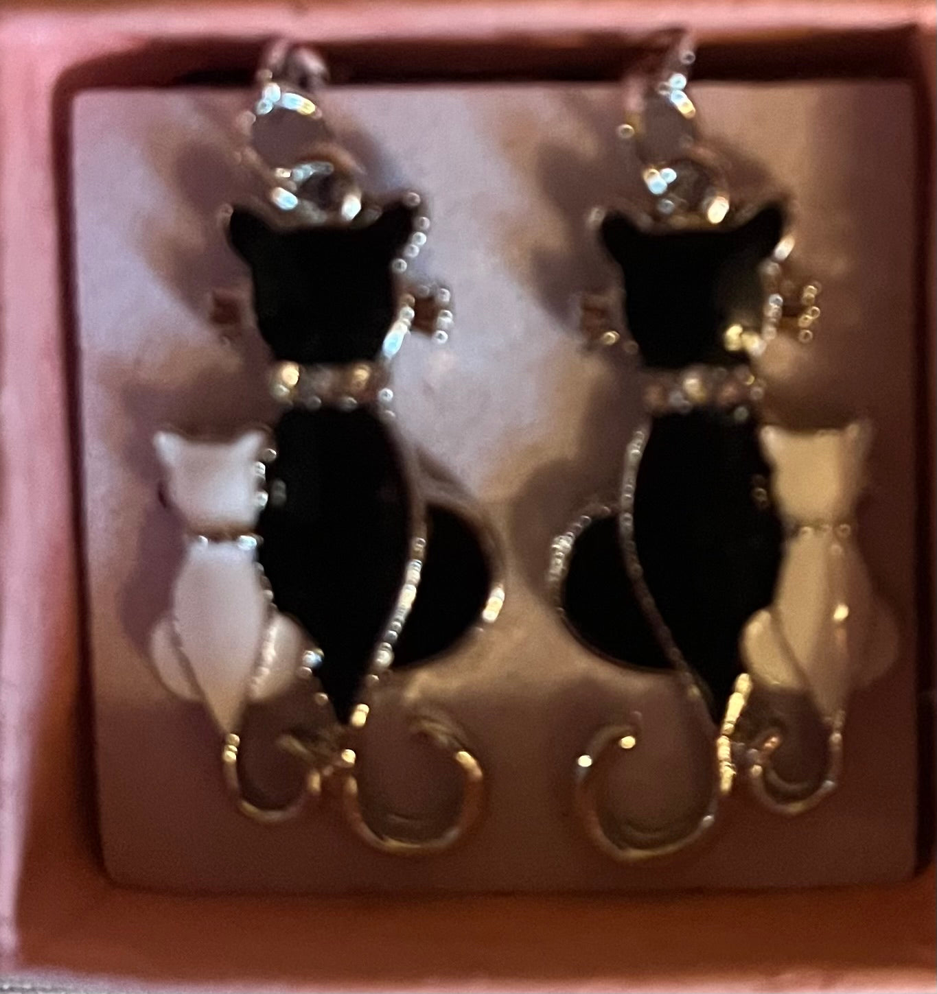 Black/white cat earrings