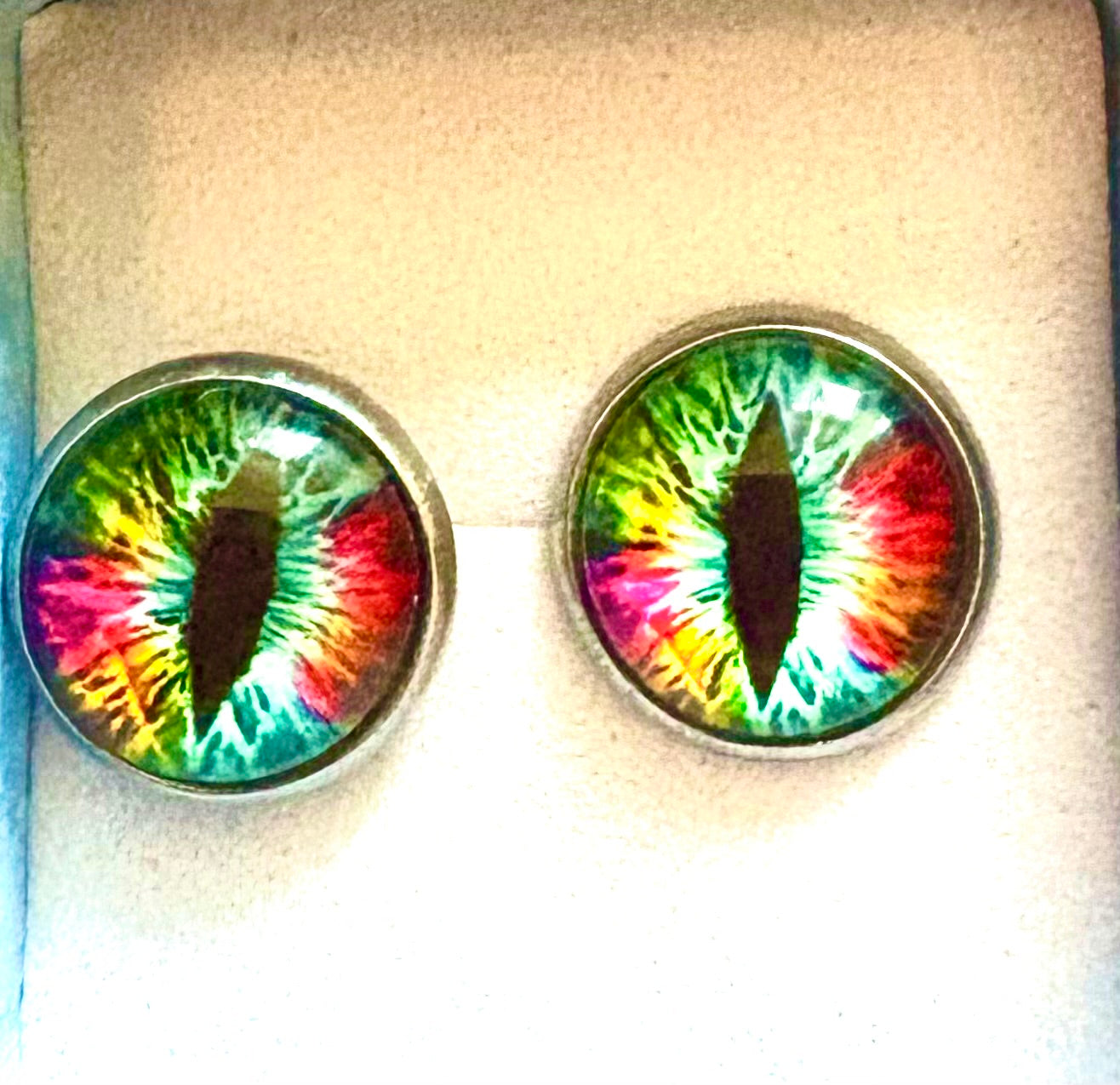 Dragon - multicoloured dragon eye stud earrings.