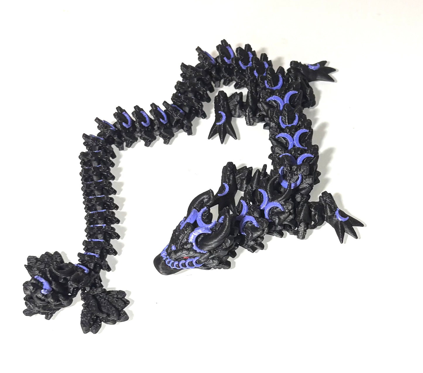 3D printed Dragon - black/ purple with red eyes.