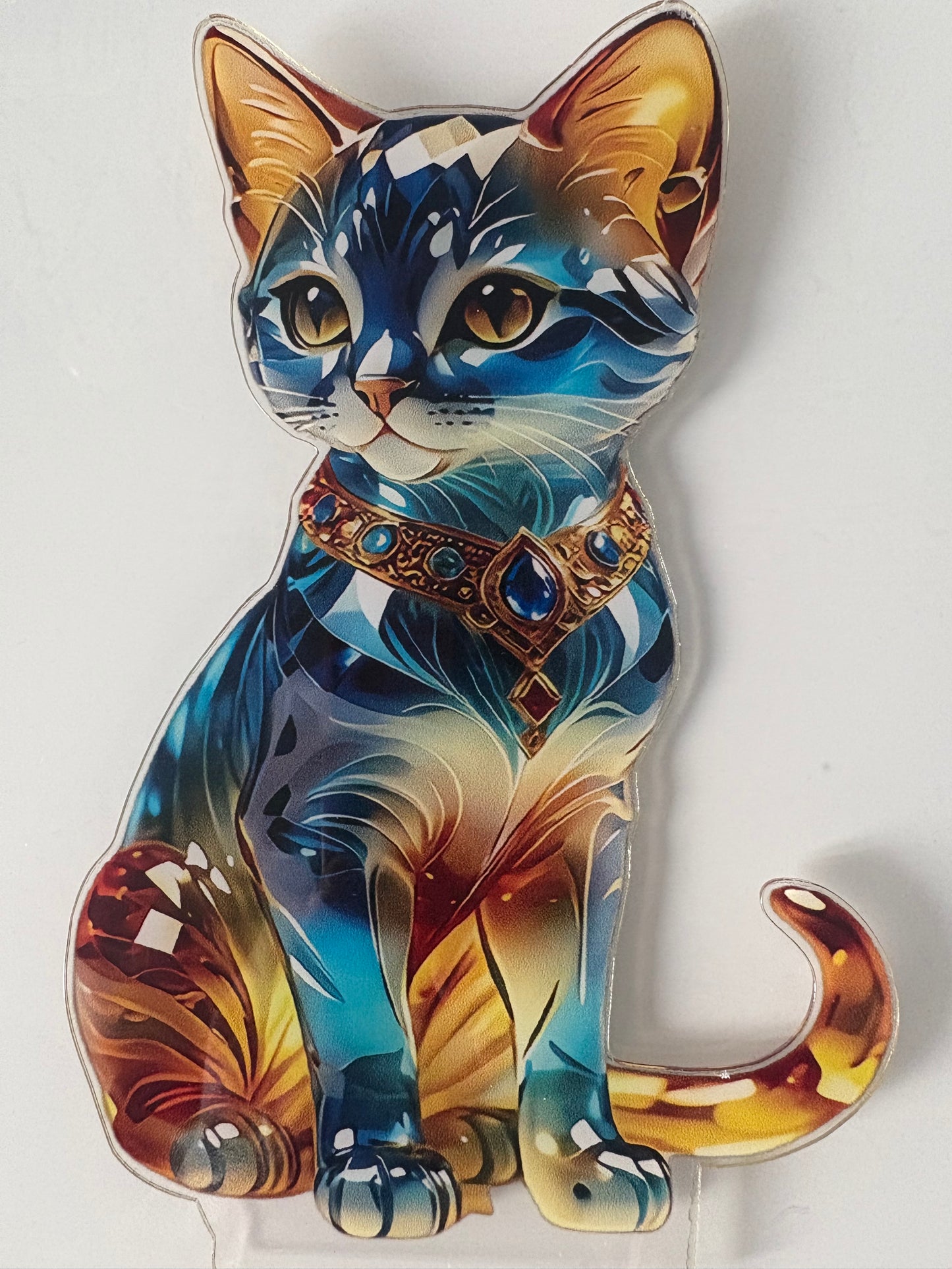 Cat - plastic blue/ golden coloured plastic/ acrylic cat on stand