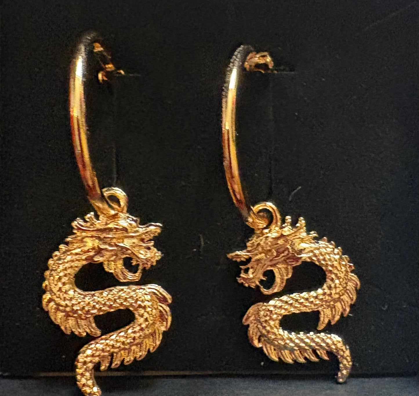Dragon - pair of earrings. Gold coloured