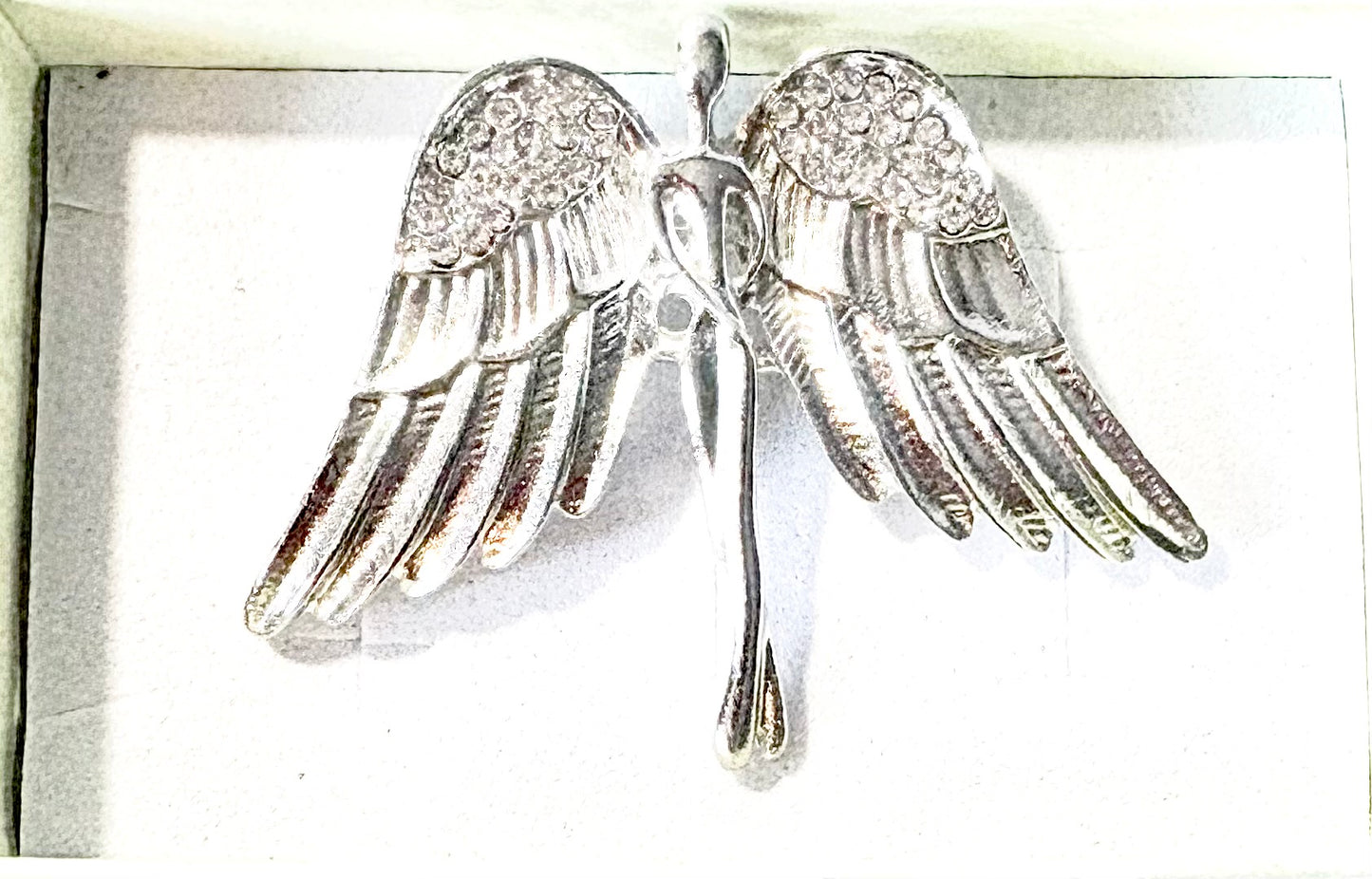 Angel brooch - silvery coloured