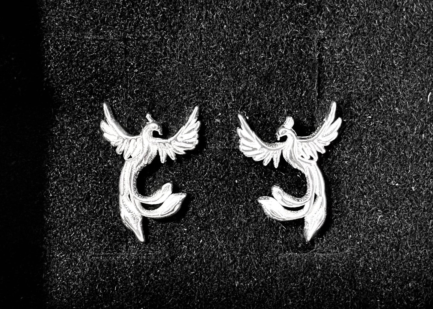 Small phoenix stud earrings - silvery coloured coloured.